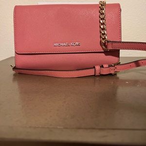 Pink Michael Kors crossbody with removable 8 card slot wristlet